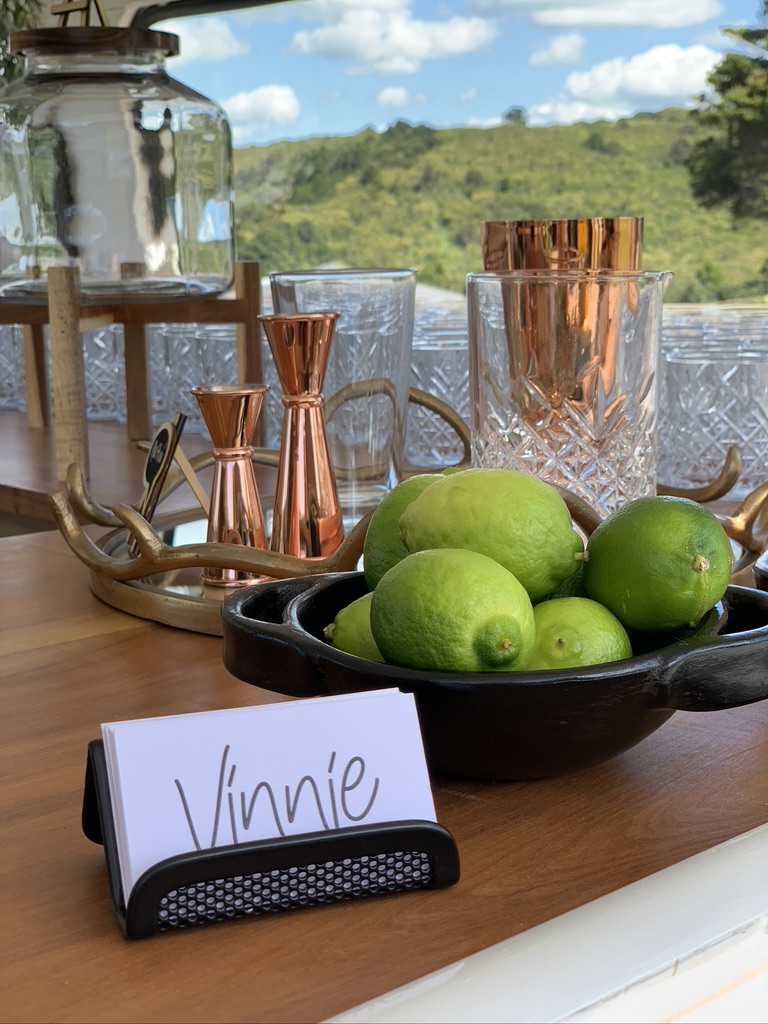 Fresh limes and copper jiggers styled on Vinnie's bar