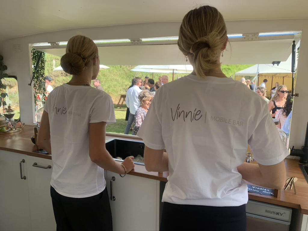 Vinnie mobile bar staff serving guests at an event